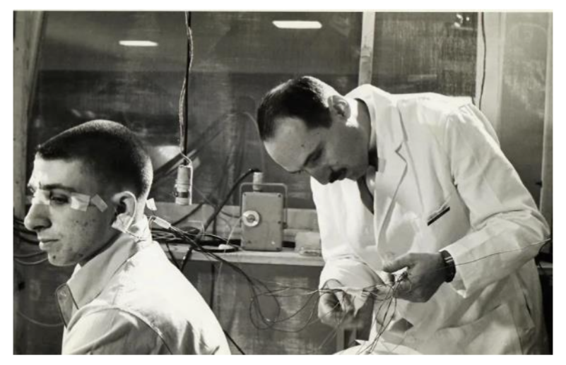 Fig.3. Neuroscientist Eugene Aserinsky (right) attaches electrodes to his son, Armond, who was a frequent subject in Eugene s early sleep studies.