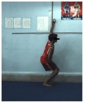Figure no. 7: The player stood with one side towards the wall and held a piece of chalk in the hand nearest to the wall